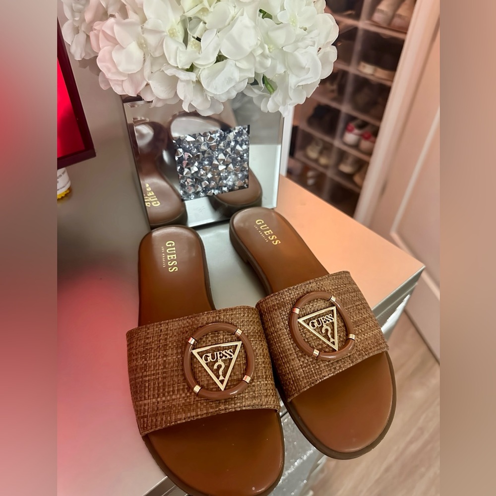 Guess sandals size 8 1/2. Only wore a couple of times.